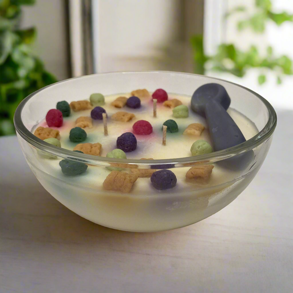 Crunch Time Cap'n cereal scented soy candle with colorful soy cereal pieces.