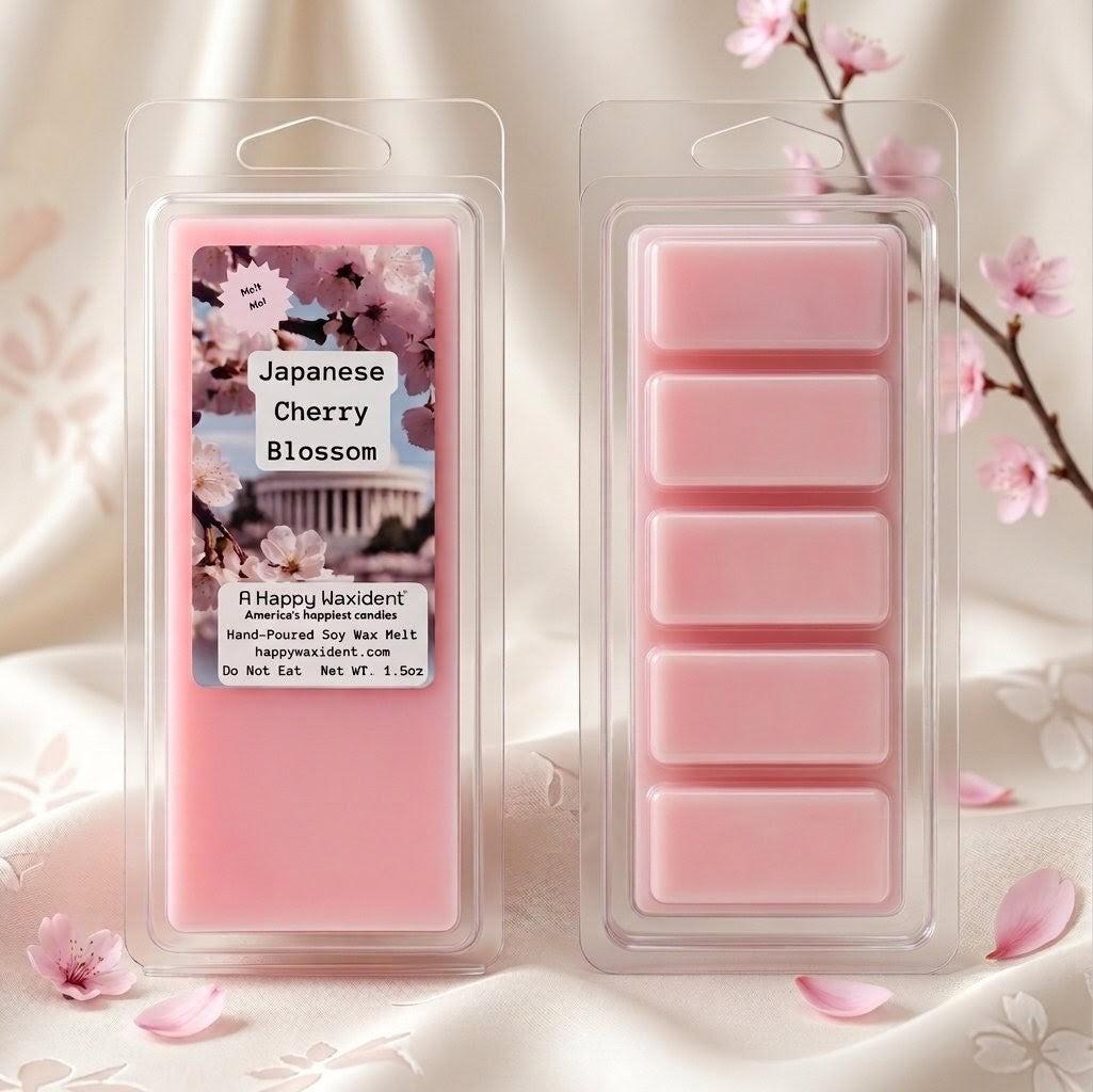 Pink wax melts in packaging with cherry blossom design on a soft background